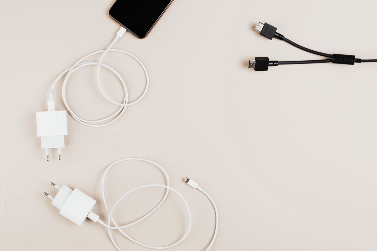 Digital device charging station showing organized tech setup for security best practices