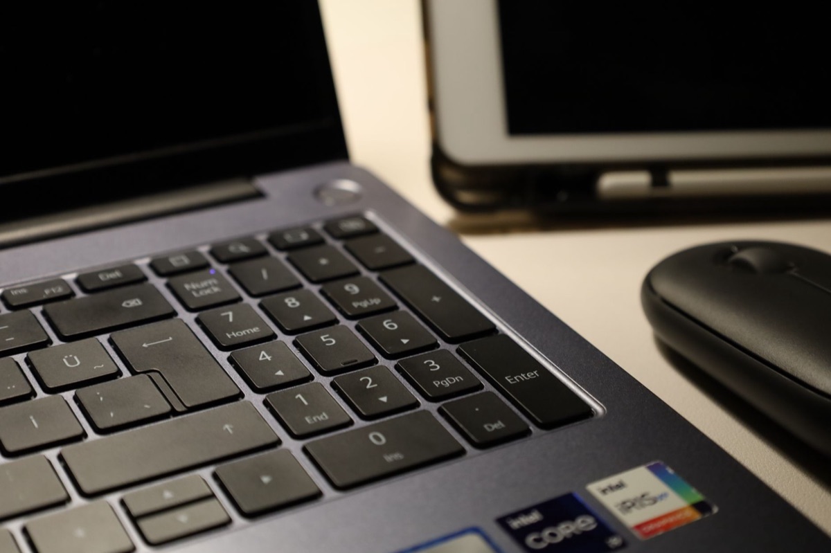 computer keyboard with multiple devices